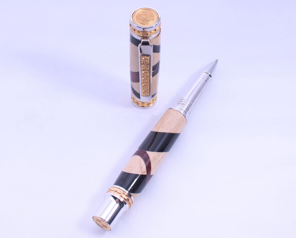 Maple, Ebony and Purpleheart Emperor Jr rollerball pen with rhodium and 24k gold accents